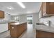 Bright kitchen with island overlooking water view at 1028 Marietta Ln, Eustis, FL 32726