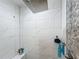 Bathroom with shower and tile surround at 104 Bentley Oaks Blvd, Auburndale, FL 33823
