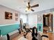 Bedroom with ceiling fan, laminate floors, and closet at 104 Bentley Oaks Blvd, Auburndale, FL 33823