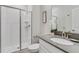 Bright bathroom with a glass-enclosed shower, modern sink, and elegant finishes at 1188 Challenge Dr, Davenport, FL 33896