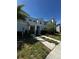 Contemporary townhomes with stone accents, professional landscaping, and welcoming walkways at 1188 Challenge Dr, Davenport, FL 33896