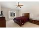 Cozy bedroom featuring a large window and comfortable furnishings, creating a relaxing retreat at 1330 Broken Pine Rd, Deltona, FL 32725