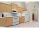 Functional kitchen featuring ample cabinet space and modern appliances at 1330 Broken Pine Rd, Deltona, FL 32725