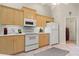 Functional kitchen featuring ample cabinet space and modern appliances at 1330 Broken Pine Rd, Deltona, FL 32725