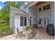 Outdoor patio area with table and chairs, offering ample space for dining and entertaining at 1417 Olympia Ave, Mount Dora, FL 32757