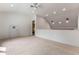 Spacious bonus room with loft and neutral carpet at 1417 Olympia Ave, Mount Dora, FL 32757