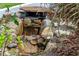 Water feature showcasing natural stones, adding tranquility to the landscape at 1417 Olympia Ave, Mount Dora, FL 32757