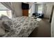 Bedroom with large bed, side windows and furniture at 1433 Kingston Ave, Orlando, FL 32807