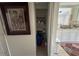 Organized storage closet with shelves, cleaning supplies, and extra household items at 1433 Kingston Ave, Orlando, FL 32807