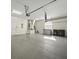 Two-car garage with door to the inside of the home at 1551 Sherbrook Dr, Clermont, FL 34711