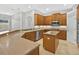 Well-designed kitchen with ample countertop space, stainless steel appliances, and a functional center island at 1551 Sherbrook Dr, Clermont, FL 34711