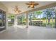 Screened in lanai with beautiful view and dual ceiling fans at 1551 Sherbrook Dr, Clermont, FL 34711
