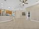 Open-concept living space with a kitchen view at 1551 Sherbrook Dr, Clermont, FL 34711