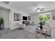 Comfortable living room with neutral tones, stylish decor, and ample natural light at 17309 Cagan Crossing Blvd, Clermont, FL 34714