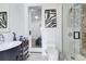 Contemporary bathroom with a unique vanity, glass shower, and modern decor at 1766 Alaqua Dr, Longwood, FL 32779