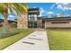 Stunning home with large stone accents, and a contemporary walkway at 1766 Alaqua Dr, Longwood, FL 32779