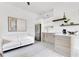 Contemporary kitchenette with sleek cabinets, stainless steel appliances, and a cozy living area at 1766 Alaqua Dr, Longwood, FL 32779