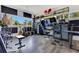 Music studio with sound equipment, guitars, and natural light from a window at 1766 Alaqua Dr, Longwood, FL 32779