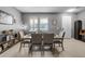 Formal dining room with a neutral color scheme and a wooden table at 199 Boysenberry Ln, Daytona Beach, FL 32124