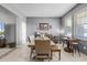 Formal dining room with large wooden table and seating, accented by stylish decor at 199 Boysenberry Ln, Daytona Beach, FL 32124