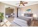 Bright bedroom with mirrored closet, hardwood floors, and a calming color palette at 200 Saint Andrews Blvd # 1004, Winter Park, FL 32792
