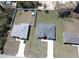 Aerial view of two modern homes with spacious yards and long driveways, showcasing a desirable neighborhood setting at 2082 Sw 153Rd Loop, Ocala, FL 34473