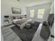 Serene main bedroom with two windows, neutral decor, stylish furnishings, and a patterned area rug at 2082 Sw 153Rd Loop, Ocala, FL 34473