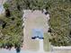 Aerial view of a house on a large lot surrounded by trees at 2232 Sw 178Th Lane Rd, Ocala, FL 34473