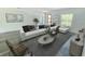 Bright and airy living room with stylish furniture, neutral tones, and ample natural light at 2232 Sw 178Th Lane Rd, Ocala, FL 34473