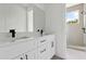 Bathroom features large vanity, double sinks and a glass walk-in shower at 2408 Lafayette Ave, Winter Park, FL 32789