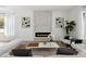 Comfortable living room with a modern fireplace, stylish decor, and plenty of seating at 2408 Lafayette Ave, Winter Park, FL 32789