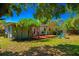 Backyard view with a deck and a firepit provides a serene outdoor experience at 2501 Weber St, Orlando, FL 32803
