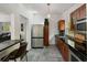 Efficient kitchen layout with stainless steel appliances and ample counter space at 2501 Weber St, Orlando, FL 32803