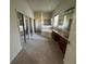 Spacious primary bathroom with a tub, a shower, tile flooring, and double vanity sinks at 2715 Bartlet Dr, Kissimmee, FL 34741
