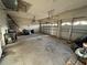 This two-car garage has painted walls, overhead lighting, and two automatic garage door openers at 2715 Bartlet Dr, Kissimmee, FL 34741