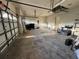 Garage with ample room for parking with utility hookups and a washing machine at 2715 Bartlet Dr, Kissimmee, FL 34741