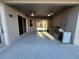 Outdoor kitchen with appliances, ceiling fan, and sliding glass door to the interior at 2715 Bartlet Dr, Kissimmee, FL 34741