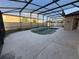 Enclosed outdoor pool and patio, fully screened and ready for summer fun at 2715 Bartlet Dr, Kissimmee, FL 34741