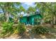Charming single-Gathering home with a lush front yard, offering privacy and curb appeal at 290 Pine St, Ormond Beach, FL 32174
