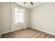 Bedroom featuring neutral walls and carpet, and a window with curtains at 3053 Brook Stone Ter, Davenport, FL 33837