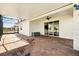 Large screened patio with brick pavers, fan and sliding glass door entry to house at 3053 Brook Stone Ter, Davenport, FL 33837