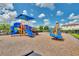 A colorful community playground with slides and climbing structures, ideal for Gathering fun at 3053 Brook Stone Ter, Davenport, FL 33837
