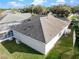Aerial view of the property with its fenced-in backyard at 4087 Clock Tower Dr, Port Orange, FL 32129