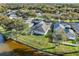 Aerial view of the property with waterfront access at 4087 Clock Tower Dr, Port Orange, FL 32129
