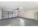 Spacious garage with ample room for parking and storage at 4087 Clock Tower Dr, Port Orange, FL 32129