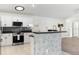 This eat in kitchen boasts updated appliances, a stylish backsplash, and a great view of the back yard at 4087 Clock Tower Dr, Port Orange, FL 32129