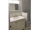 Modern bathroom vanity features a large sink and ample storage at 459 Hamptoncrest Cir # 203, Lake Mary, FL 32746