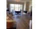 The living room has a fireplace and water view at 459 Hamptoncrest Cir # 203, Lake Mary, FL 32746