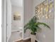 Bright bathroom with tile floors, decorative art and indoor plant at 4827 Lacewing Dr, Winter Garden, FL 34787
