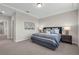 Comfortable bedroom with a plush bed, soft lighting, and neutral tones creating a relaxing and inviting space at 4827 Lacewing Dr, Winter Garden, FL 34787